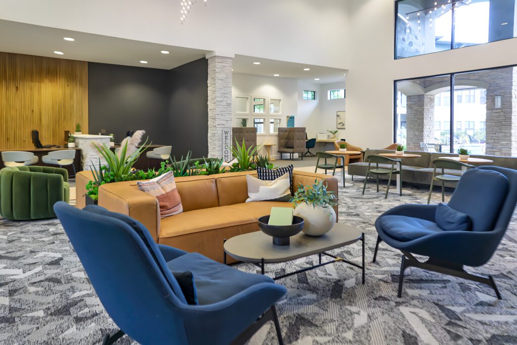 Clubhouse lounge with sofas, chairs, and booths